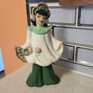 Vintage Ceramic Figurine with Green and White Dress